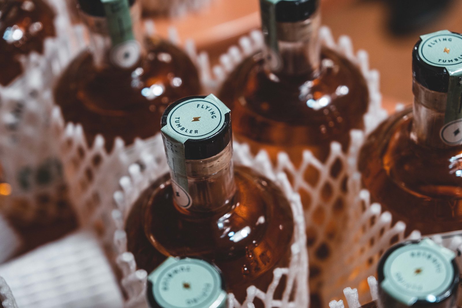 Bottles in protective netting