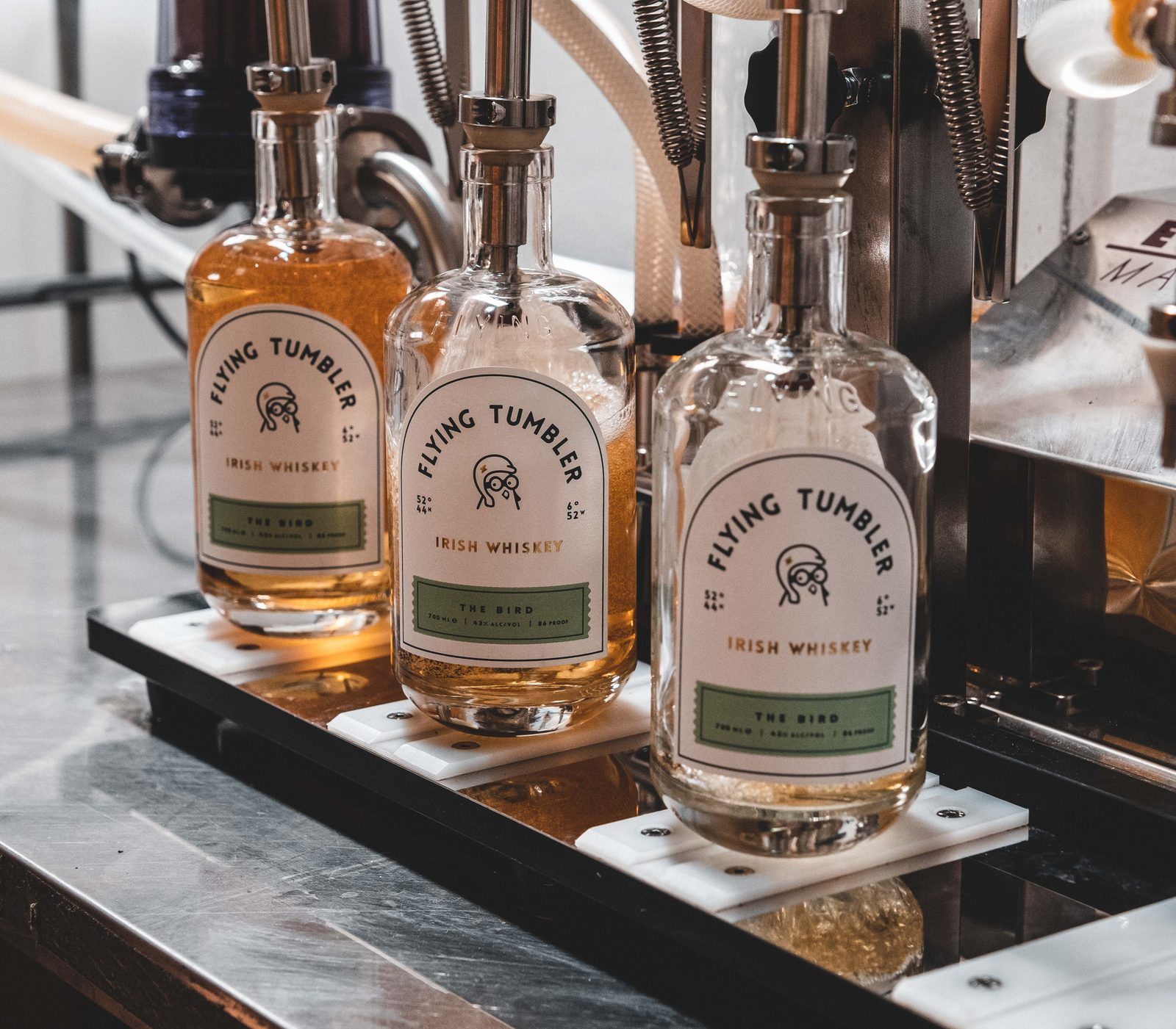 Three bottles on the filling line