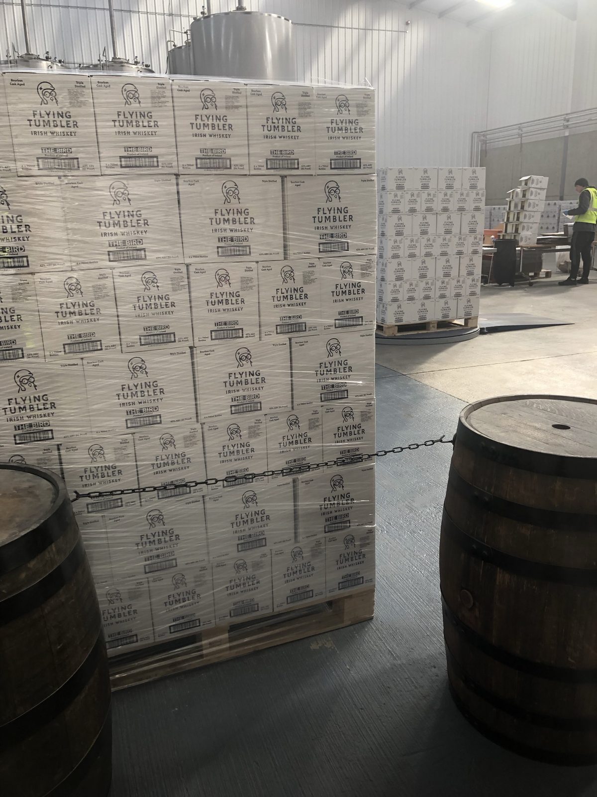 Cases of The Bird palletised in the warehouse