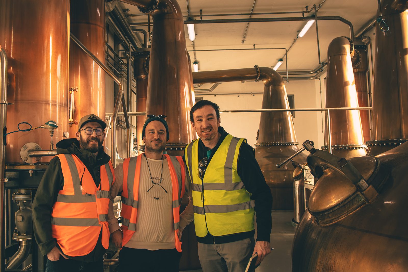 At a partner distillery beside the stills